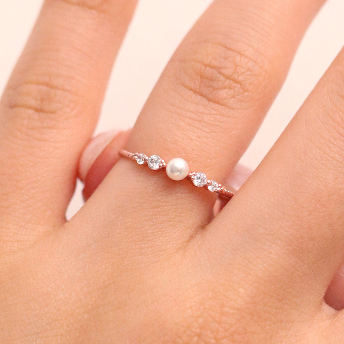 Pearl Cubic Ring featuring high-quality freshwater pearls in a unique cubic design, offering timeless elegance and sophisticated style for any occasion.