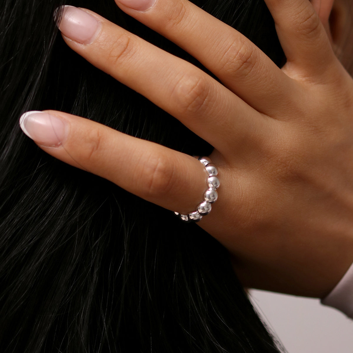 Bubble Ring made from 925 sterling silver, featuring a playful bubble design with polished circles, handmade in London for a modern, elegant touch.