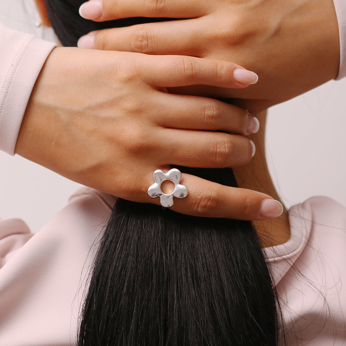 Daisy Adjustable Silver Ring crafted from high-quality silver, featuring a timeless daisy design with an adjustable fit for everyday elegance.