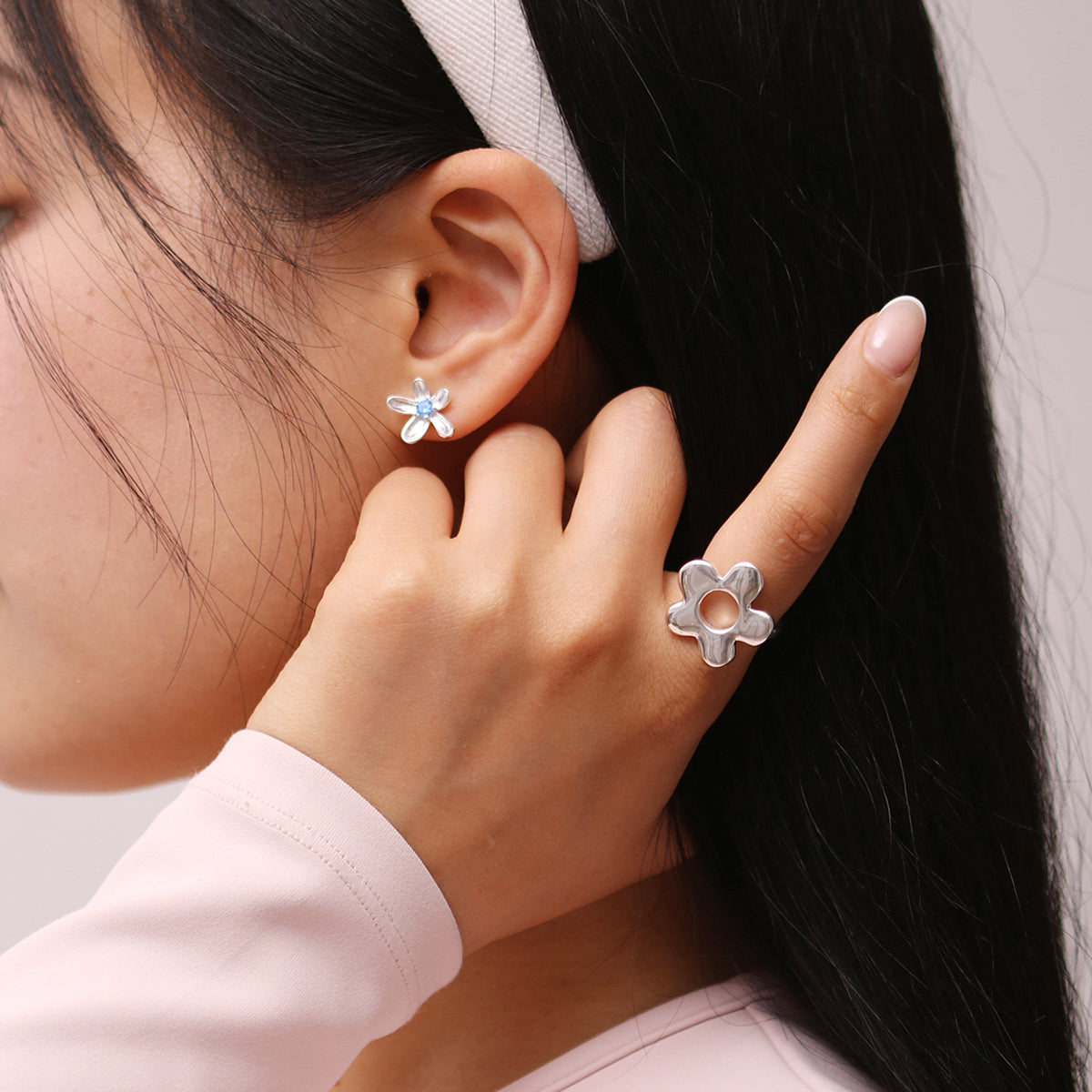 Daisy Adjustable Silver Ring crafted from high-quality silver, featuring a timeless daisy design with an adjustable fit for everyday elegance.