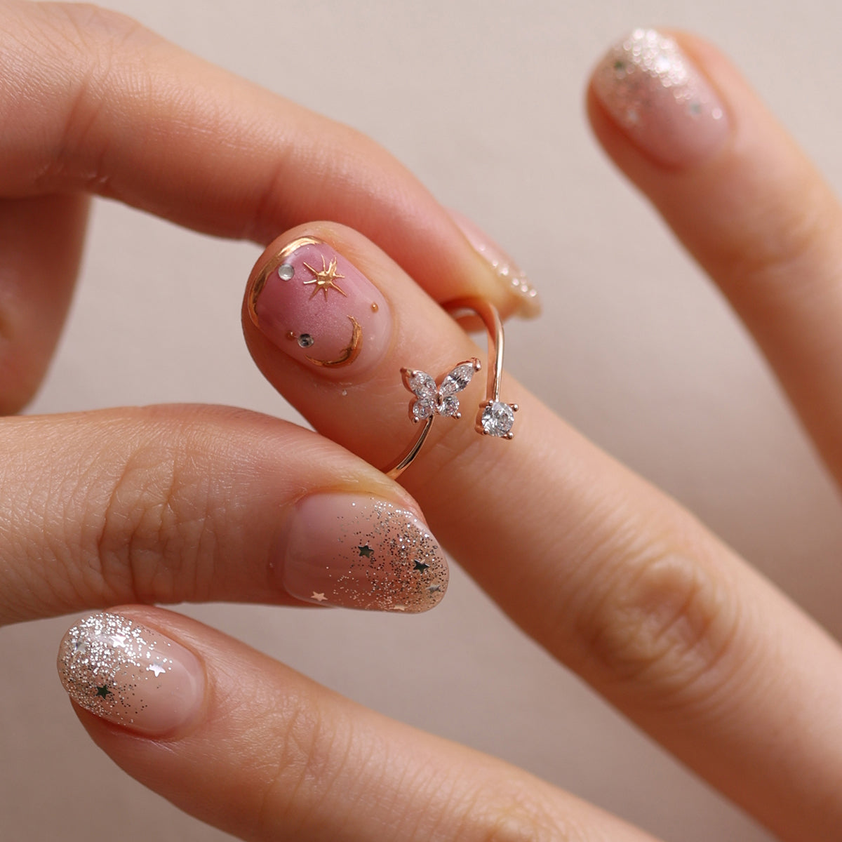 Butterfly cubic ring