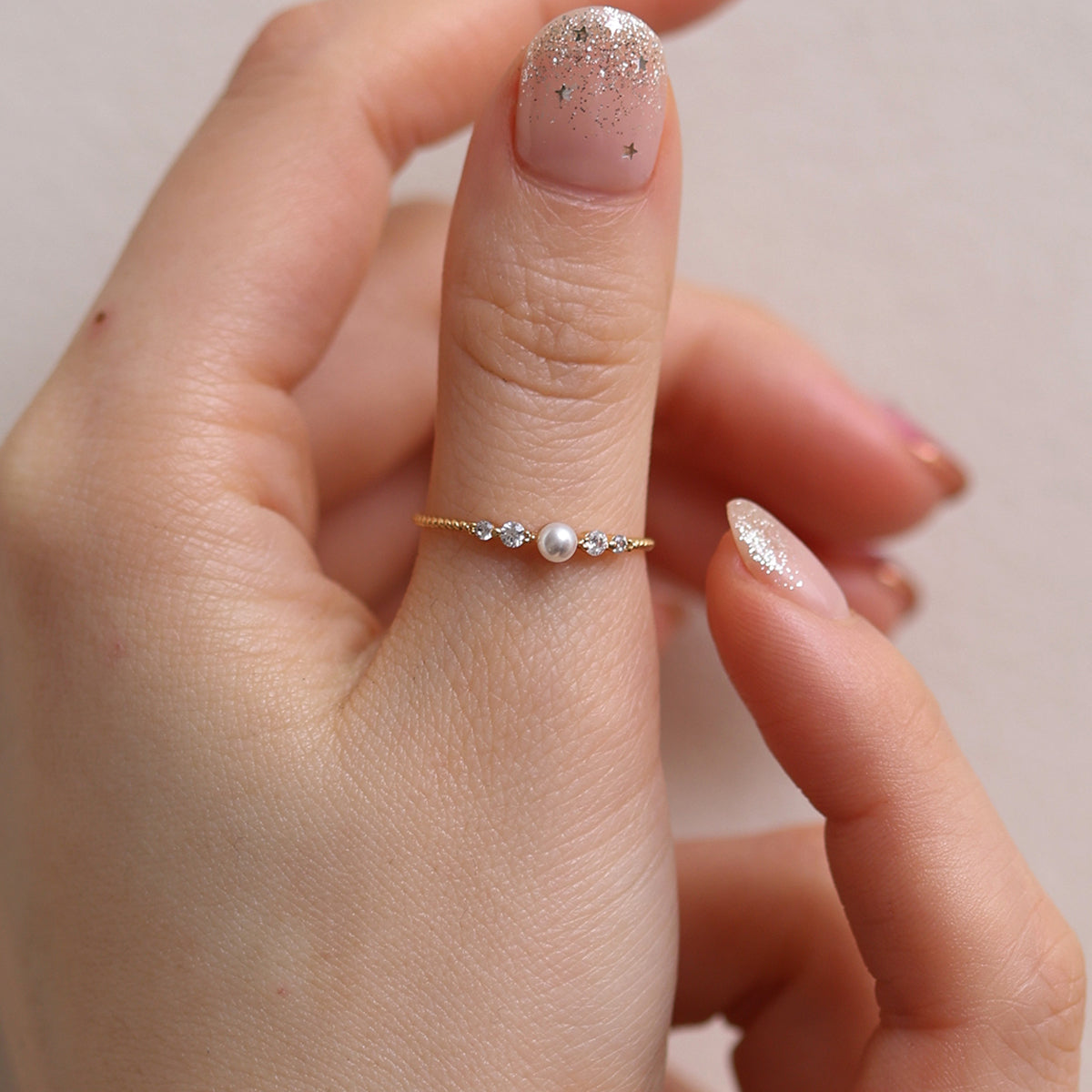 Pearl Cubic Ring featuring high-quality freshwater pearls in a unique cubic design, offering timeless elegance and sophisticated style for any occasion.