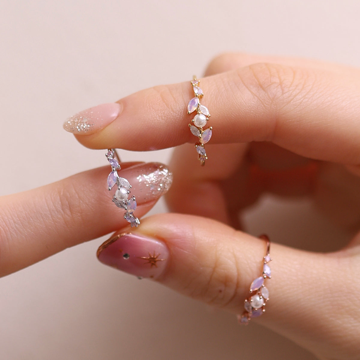 Moonstone Cubic Pearl Vine Ring featuring a delicate vine design with shimmering moonstone and lustrous cubic pearls, crafted for timeless elegance and sophistication.