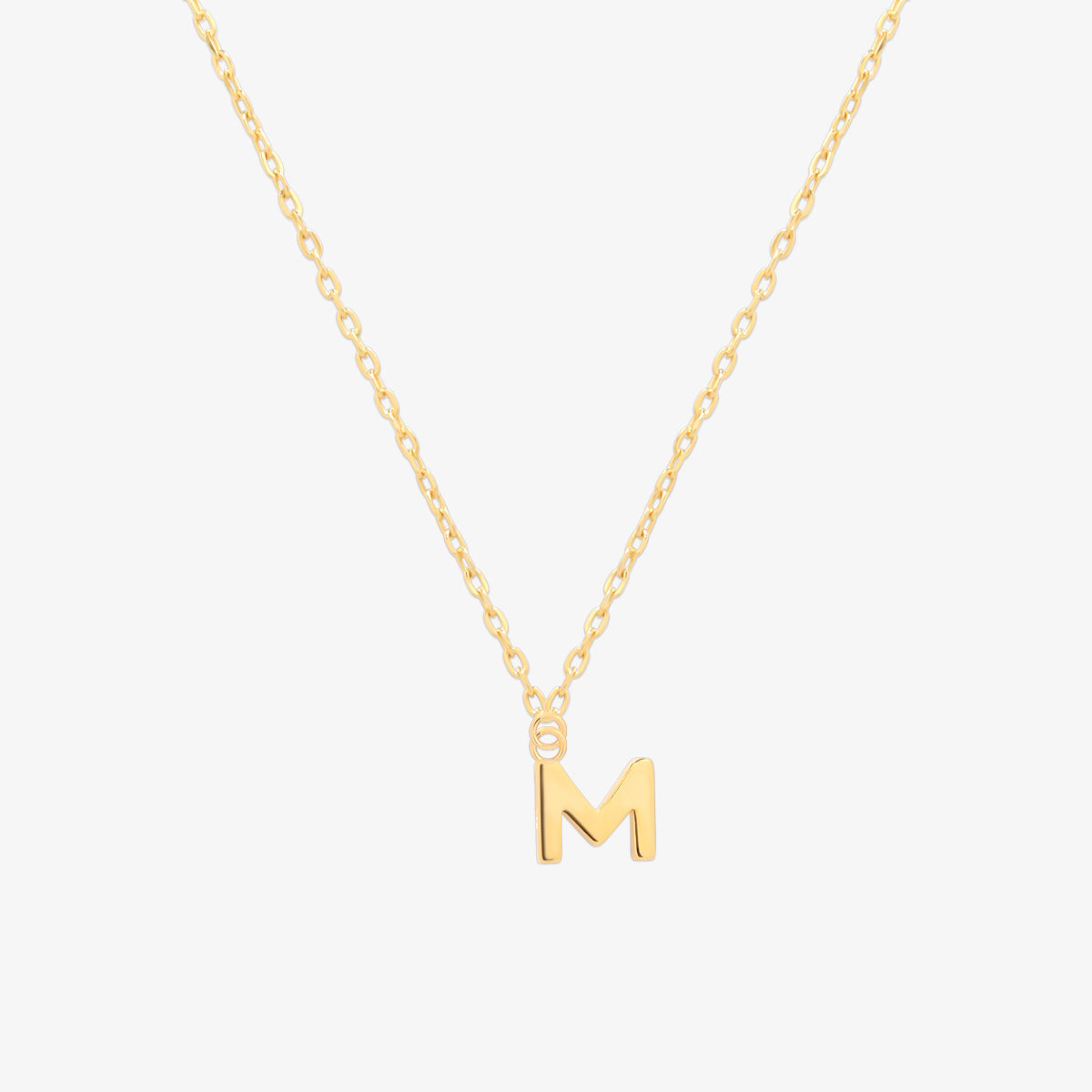 Classic initial pendant necklace featuring a polished letter charm on a delicate chain, showcasing a timeless and elegant design.