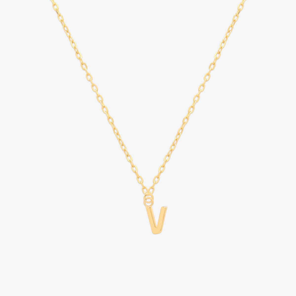 Classic initial pendant necklace featuring a polished letter charm on a delicate chain, showcasing a timeless and elegant design.