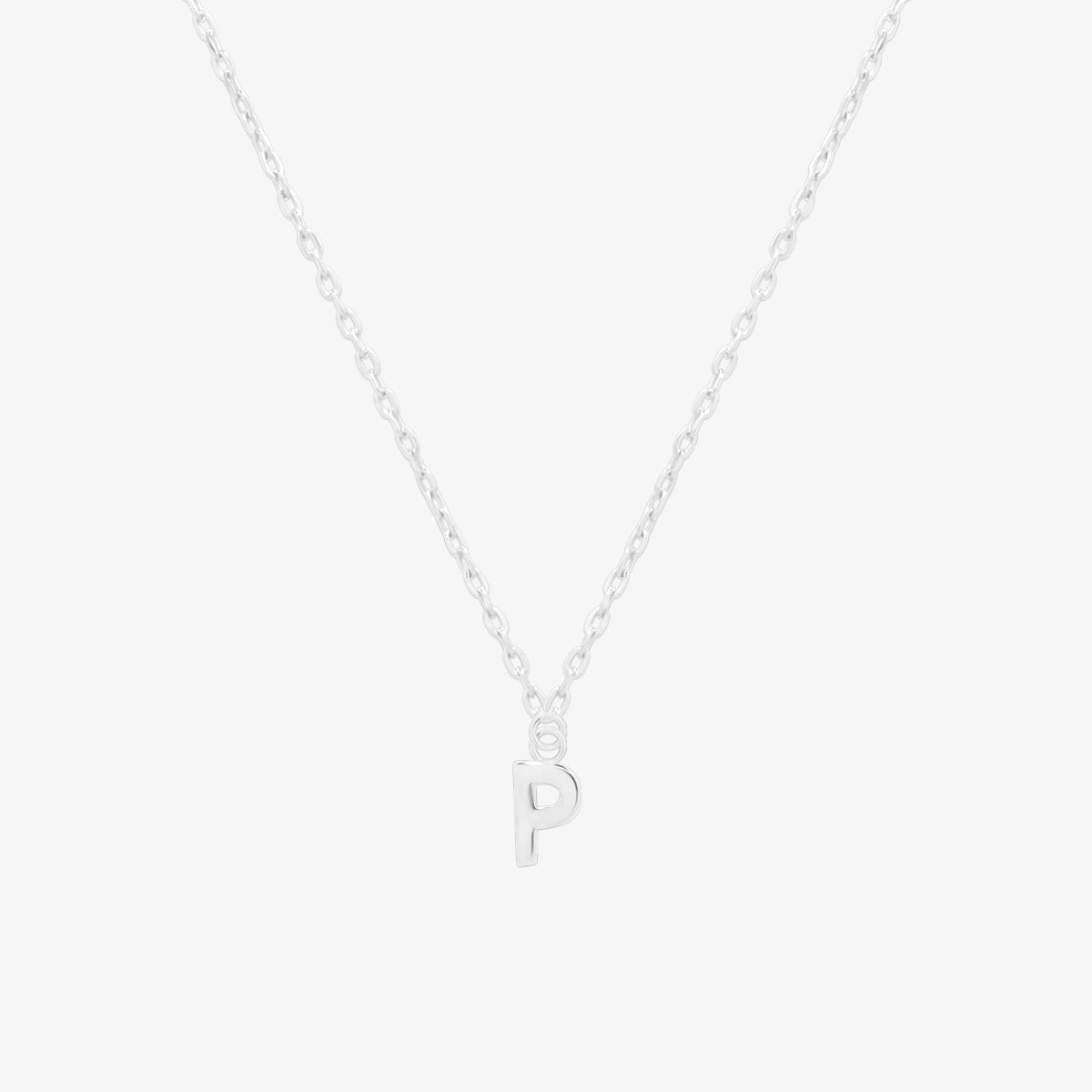 Classic initial pendant necklace featuring a polished letter charm on a delicate chain, showcasing a timeless and elegant design.