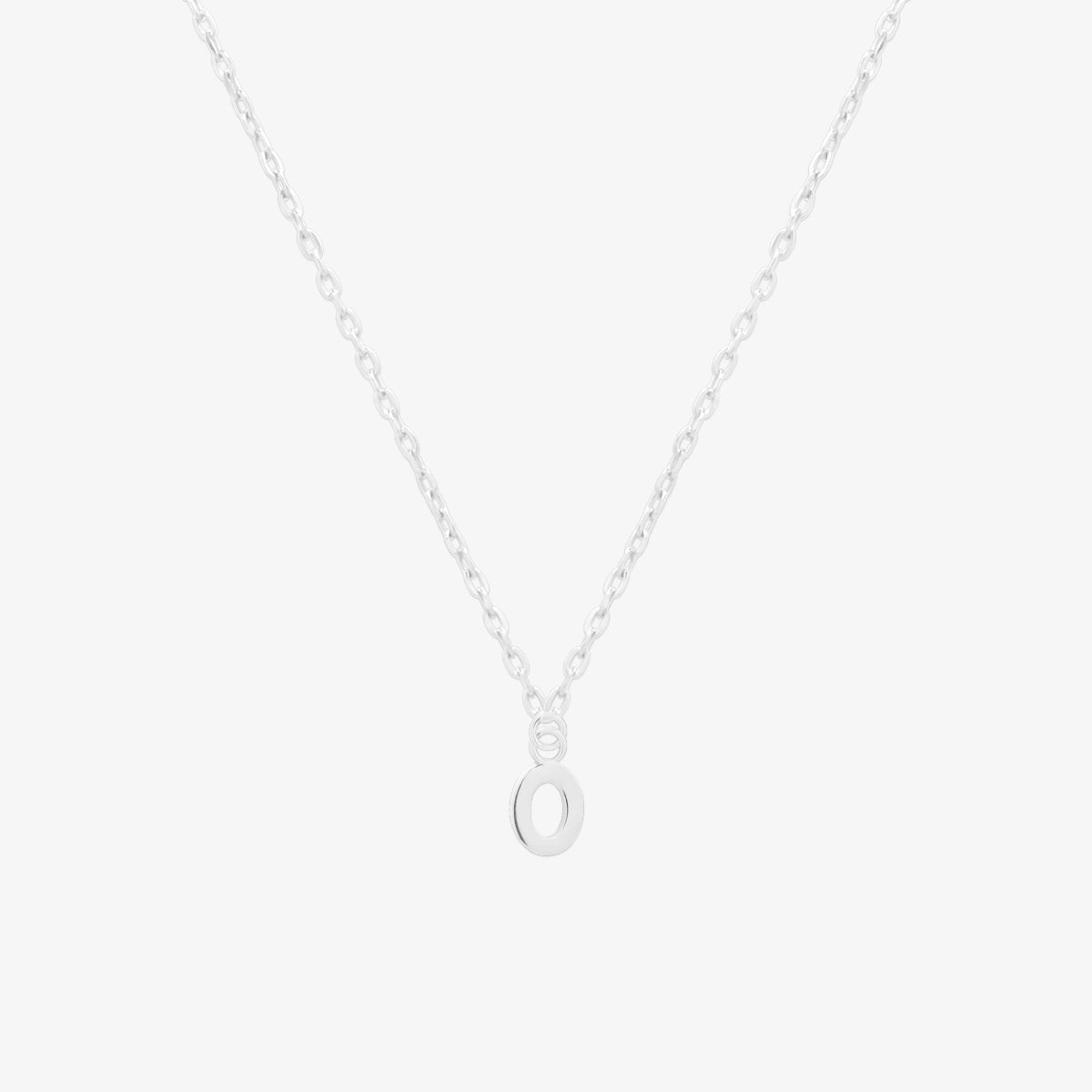 Classic initial pendant necklace featuring a polished letter charm on a delicate chain, showcasing a timeless and elegant design.