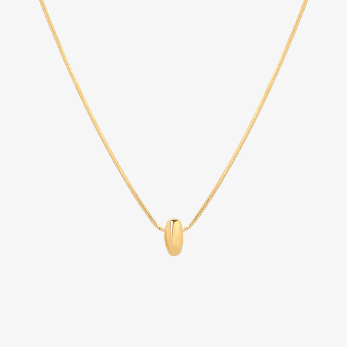 Bubble initial pendant necklace featuring a rounded, playful letter charm on a sleek snake chain, with a smooth and glossy finish.