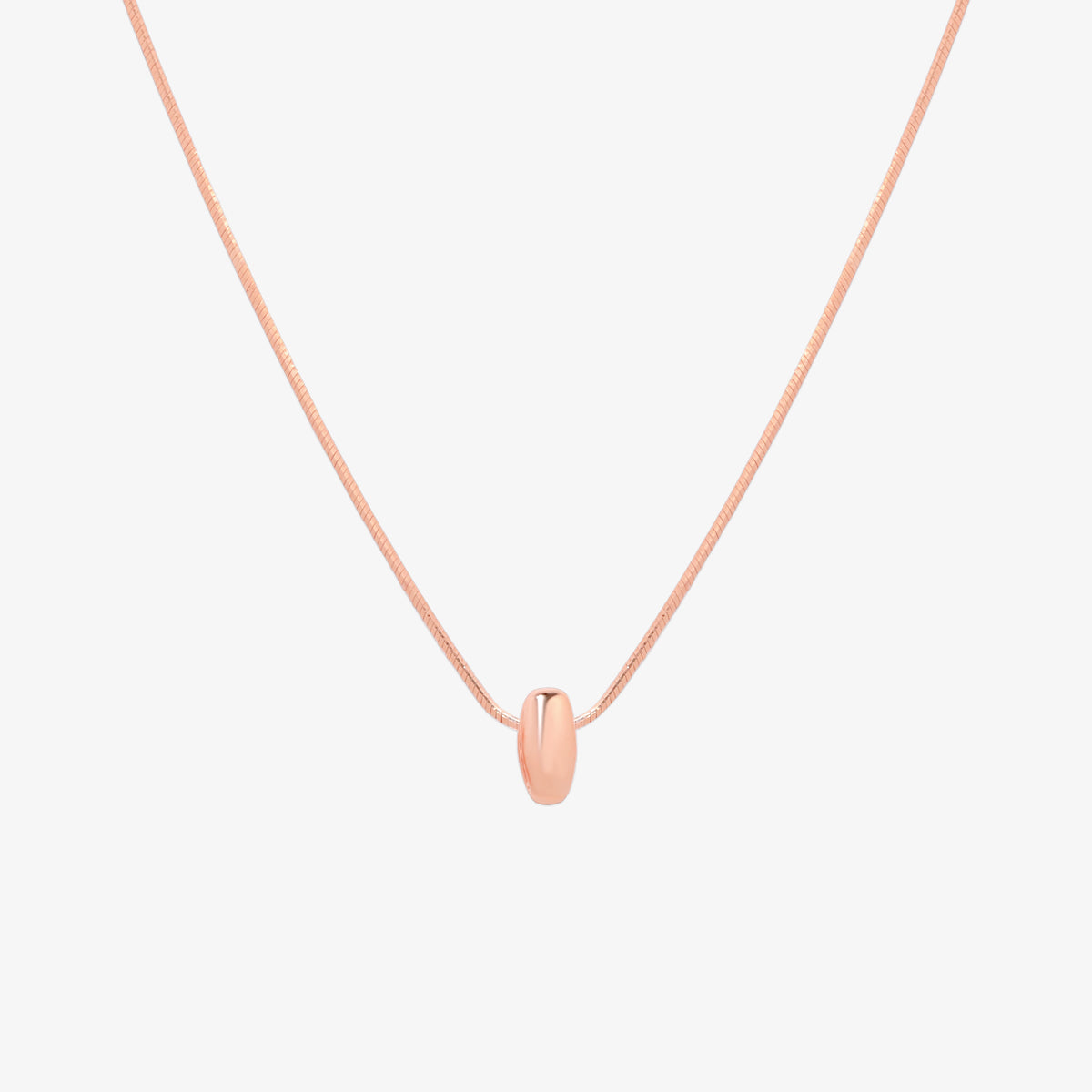 Bubble initial pendant necklace featuring a rounded, playful letter charm on a sleek snake chain, with a smooth and glossy finish.