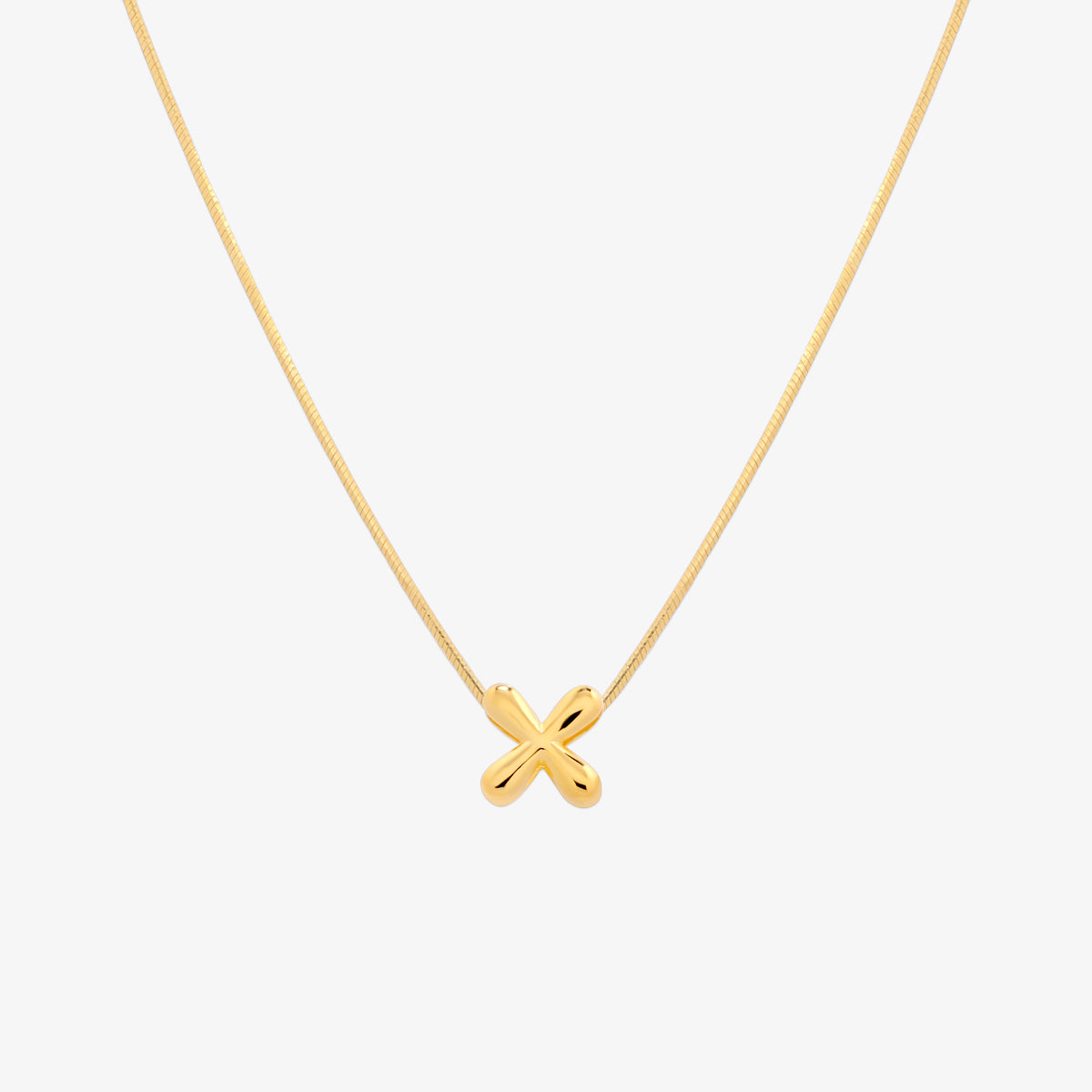 Bubble initial pendant necklace featuring a rounded, playful letter charm on a sleek snake chain, with a smooth and glossy finish.