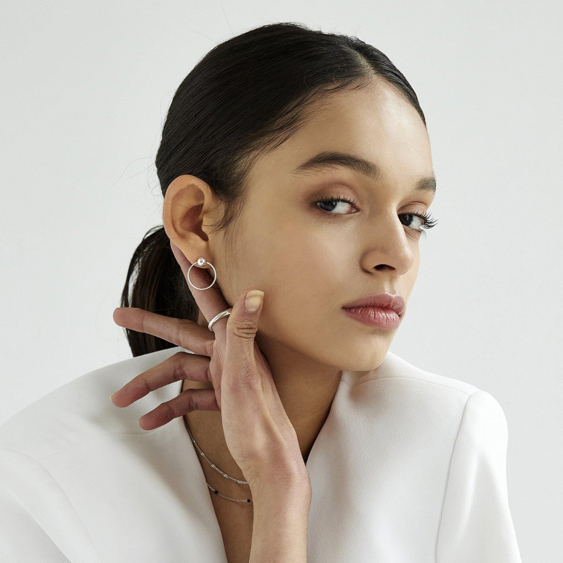 Ball with Line Circle Earrings featuring a modern geometric design with a delicate ball and sleek line detail, offering minimalist elegance and everyday versatility.