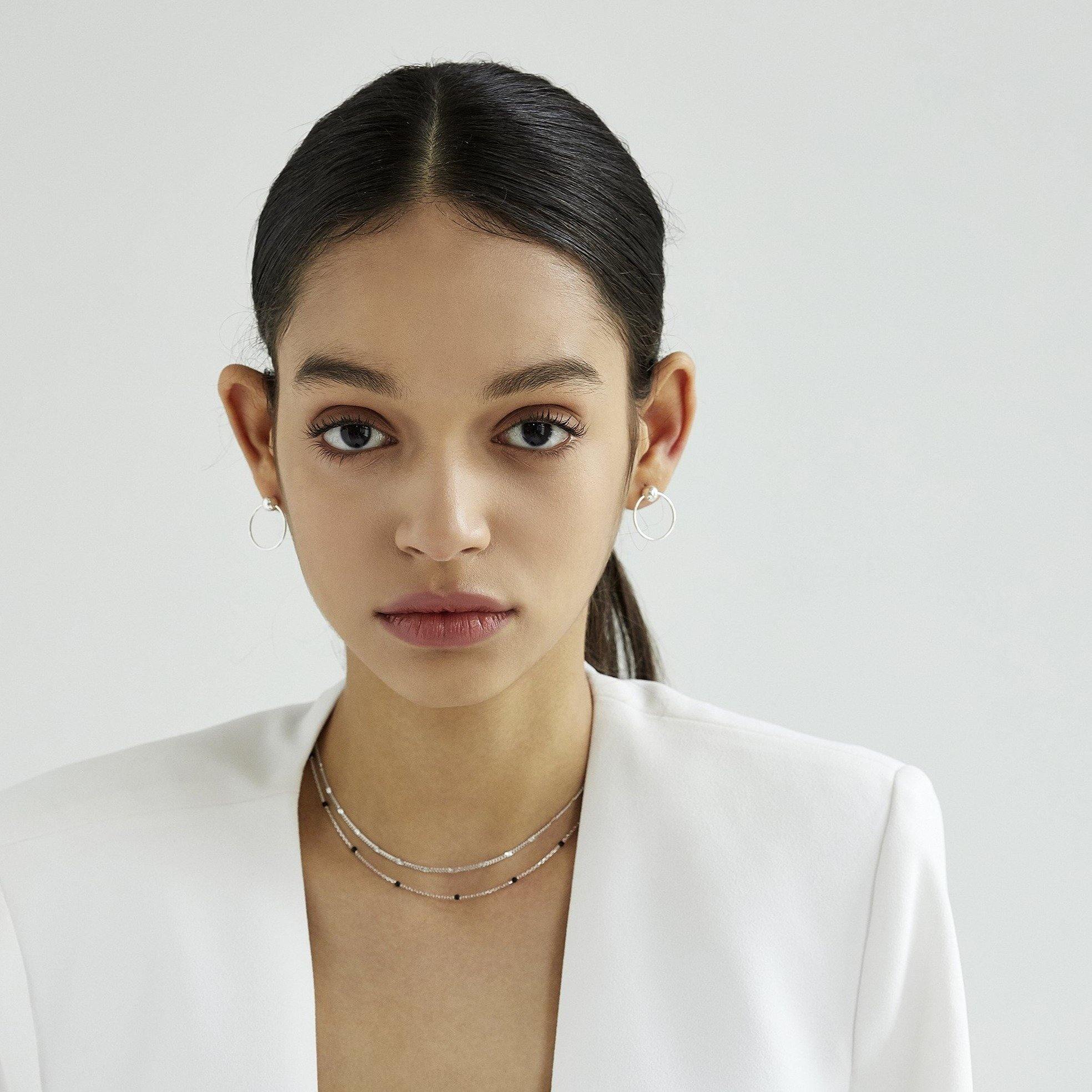 Ball with Line Circle Earrings featuring a modern geometric design with a delicate ball and sleek line detail, offering minimalist elegance and everyday versatility.