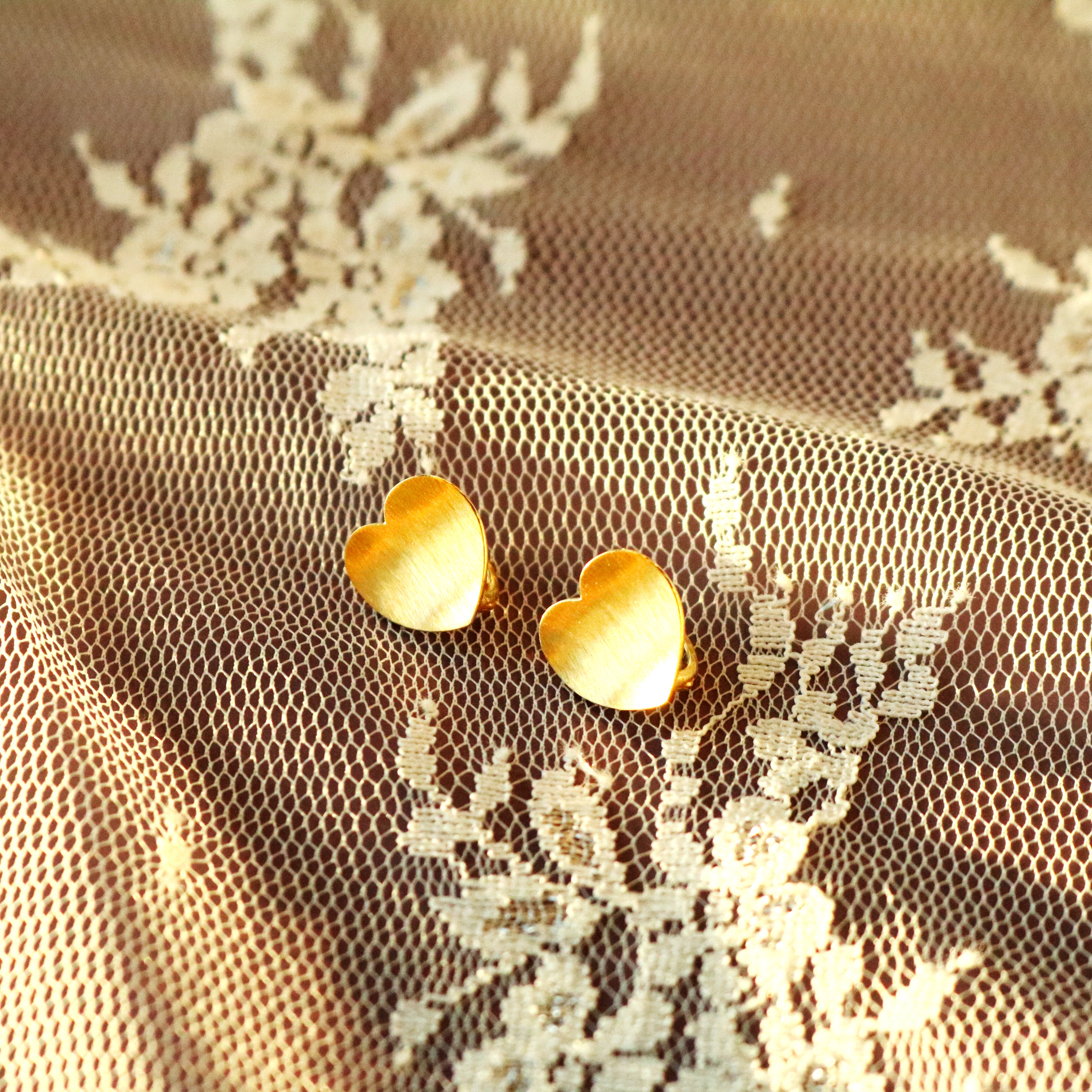 Heart huggie earrings