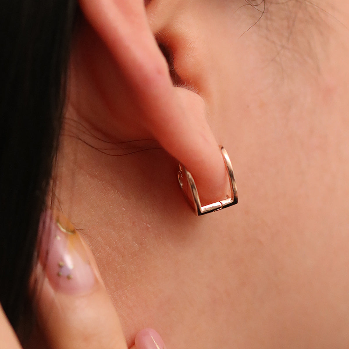 Heart silhouette huggie earrings