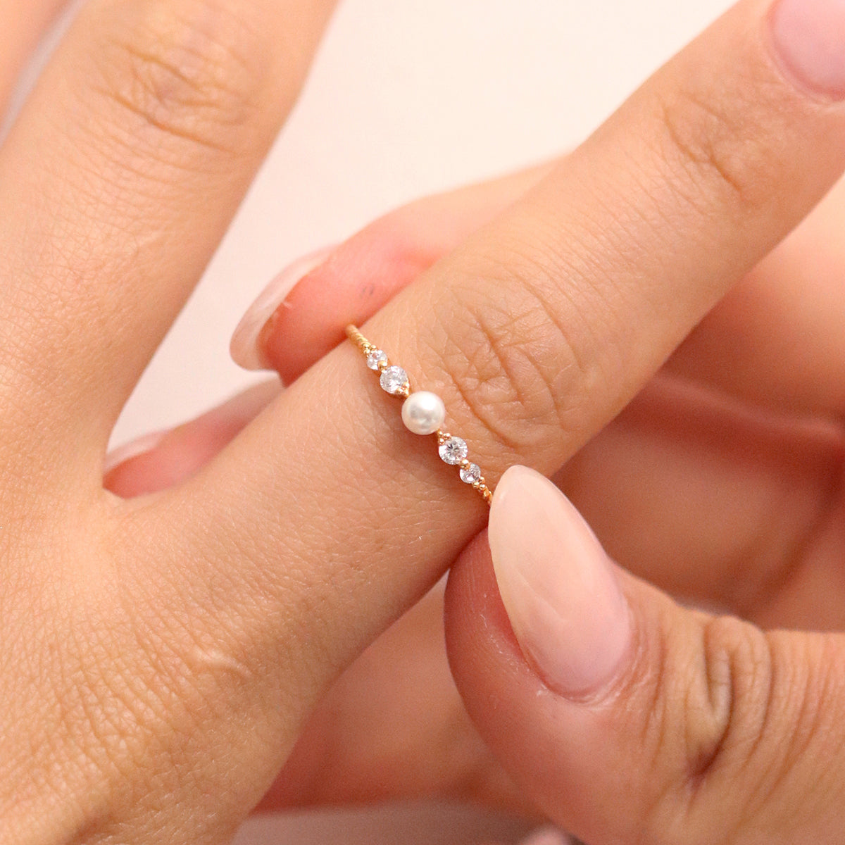 Pearl Cubic Ring featuring high-quality freshwater pearls in a unique cubic design, offering timeless elegance and sophisticated style for any occasion.