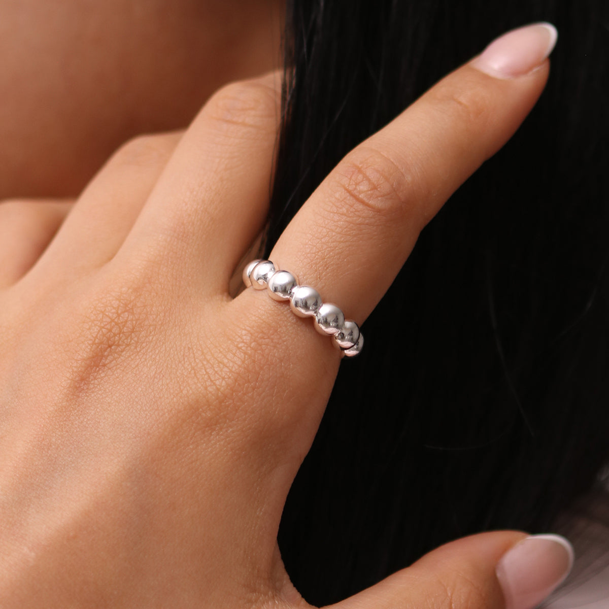 Bubble Ring made from 925 sterling silver, featuring a playful bubble design with polished circles, handmade in London for a modern, elegant touch.
