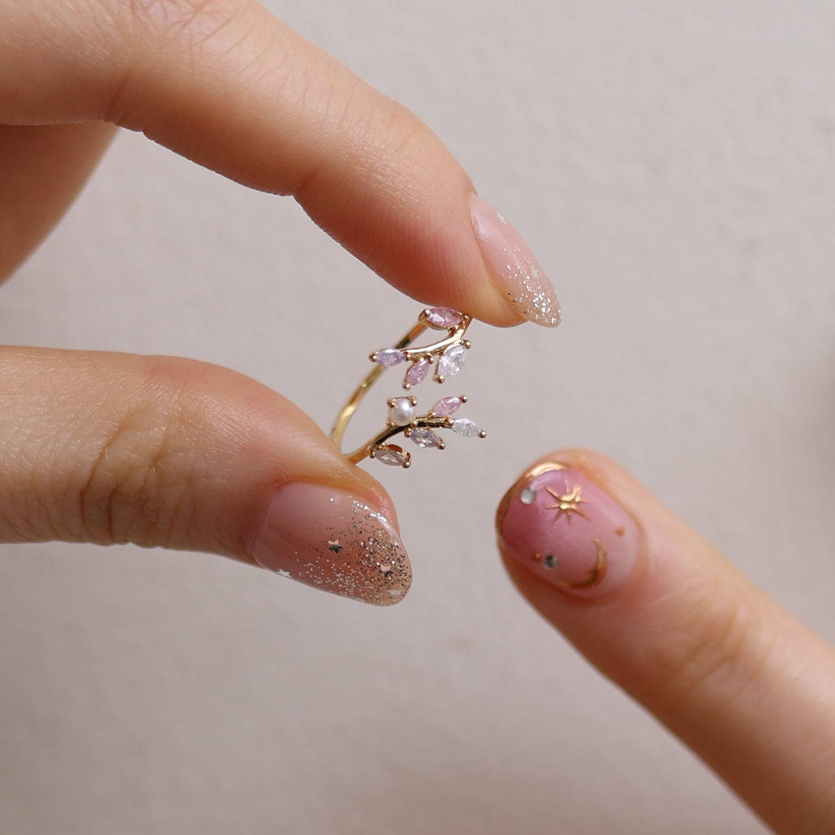 Elegant pearl vine ring with delicate vine design and lustrous pearl for a timeless, feminine look