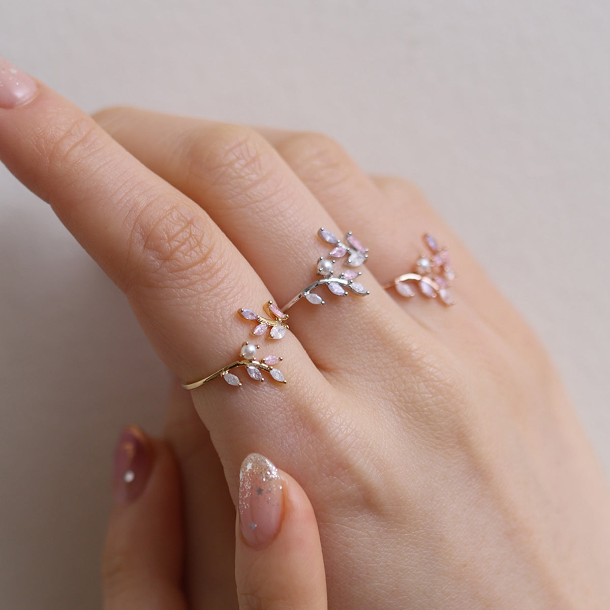 Elegant pearl vine ring with delicate vine design and lustrous pearl for a timeless, feminine look