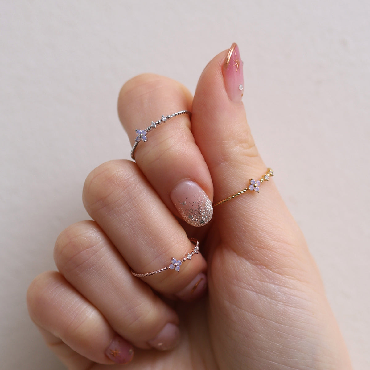 Moonstone Cubic Flower Ring handcrafted with a glowing moonstone centre and delicate cubic flower petals, blending natural beauty.