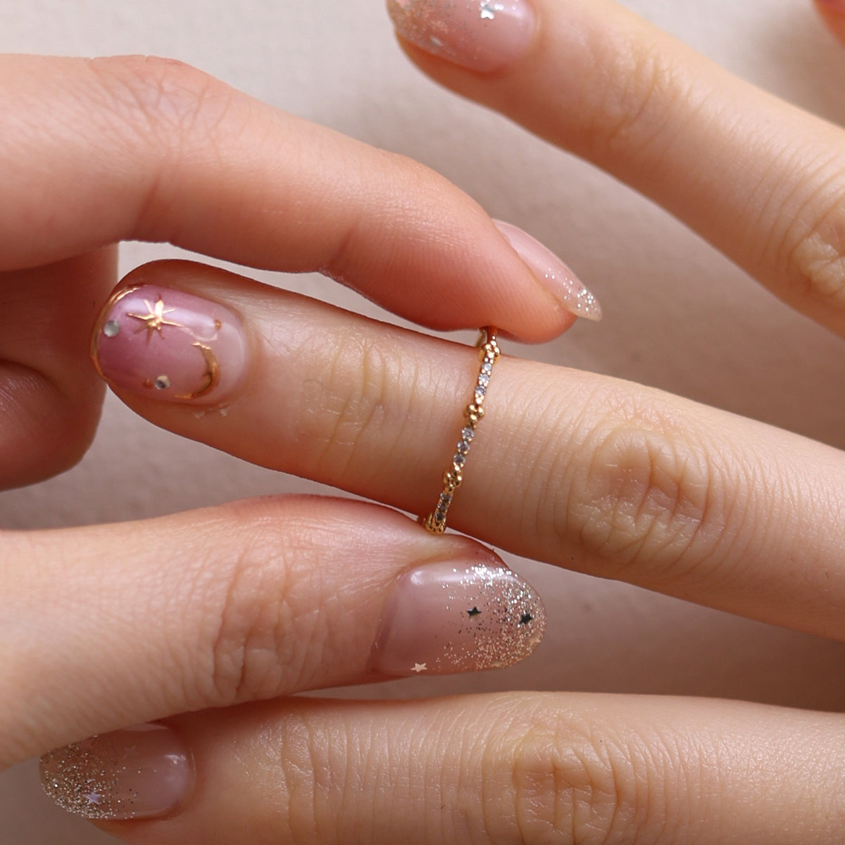 Simple Line Cubic Ring featuring a minimalist band with a single cubic zirconia, offering a sleek and elegant touch to any outfit.