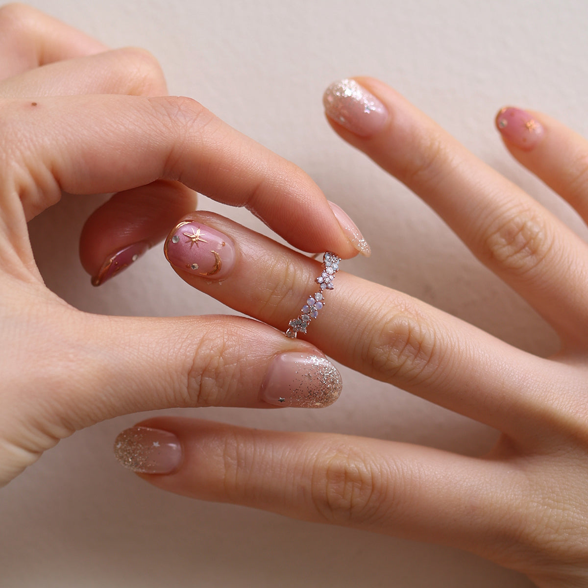 Moonstone Flower Ring featuring a radiant moonstone centre and delicate floral design, crafted from high-quality materials for a touch of timeless elegance.