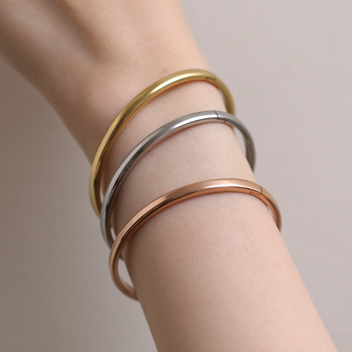 Thin Bangle featuring a precision-crafted, minimalist design with a slender profile, offering versatile style and durable elegance for any occasion.