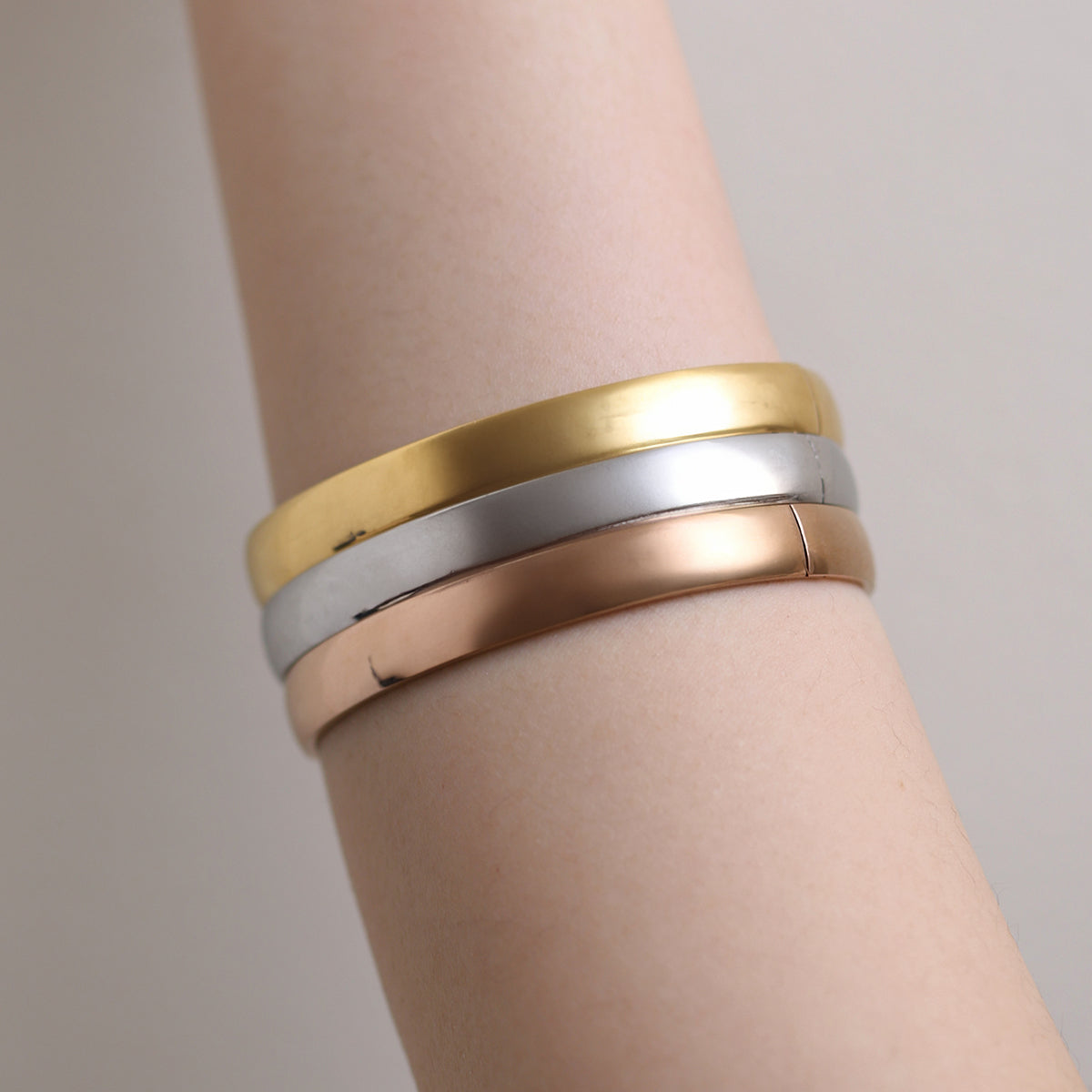 Thick Minimalist Bangle featuring clean lines and a robust profile, expertly crafted for durability and elegance—perfect for elevating both casual and formal looks.