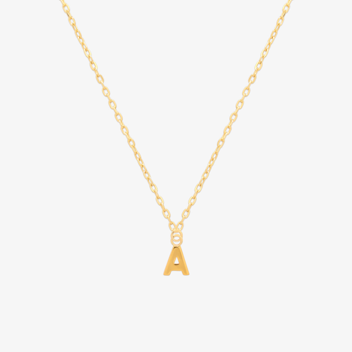 Classic initial pendant necklace featuring a polished letter charm on a delicate chain, showcasing a timeless and elegant design.