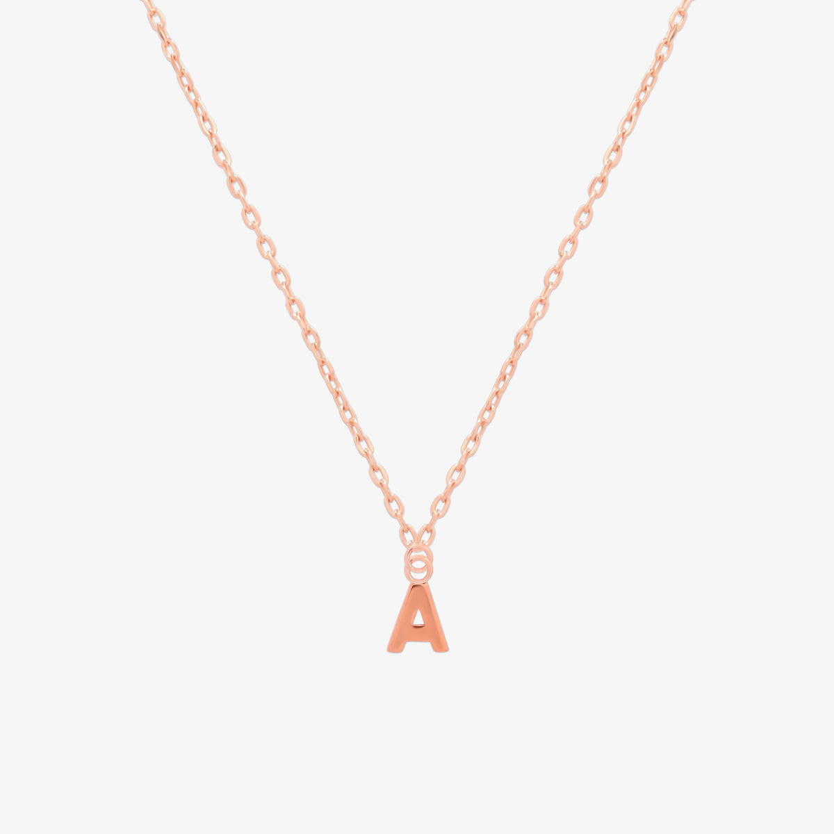 Classic initial pendant necklace featuring a polished letter charm on a delicate chain, showcasing a timeless and elegant design.