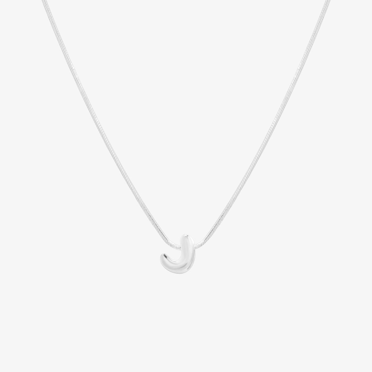 Bubble initial pendant necklace featuring a rounded, playful letter charm on a sleek snake chain, with a smooth and glossy finish.