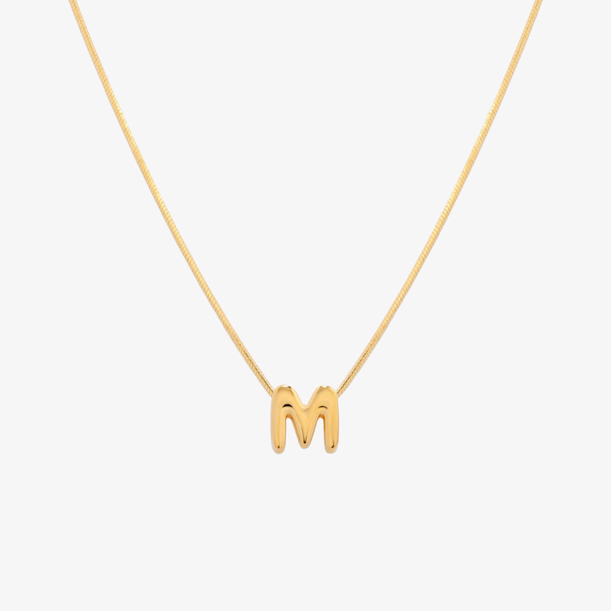 Bubble initial pendant necklace featuring a rounded, playful letter charm on a sleek snake chain, with a smooth and glossy finish.
