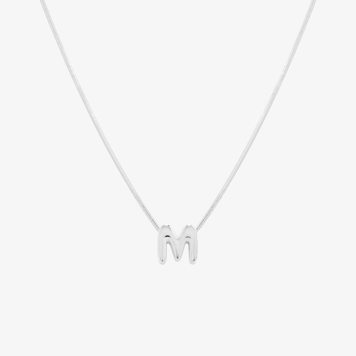 Bubble initial pendant necklace featuring a rounded, playful letter charm on a sleek snake chain, with a smooth and glossy finish.