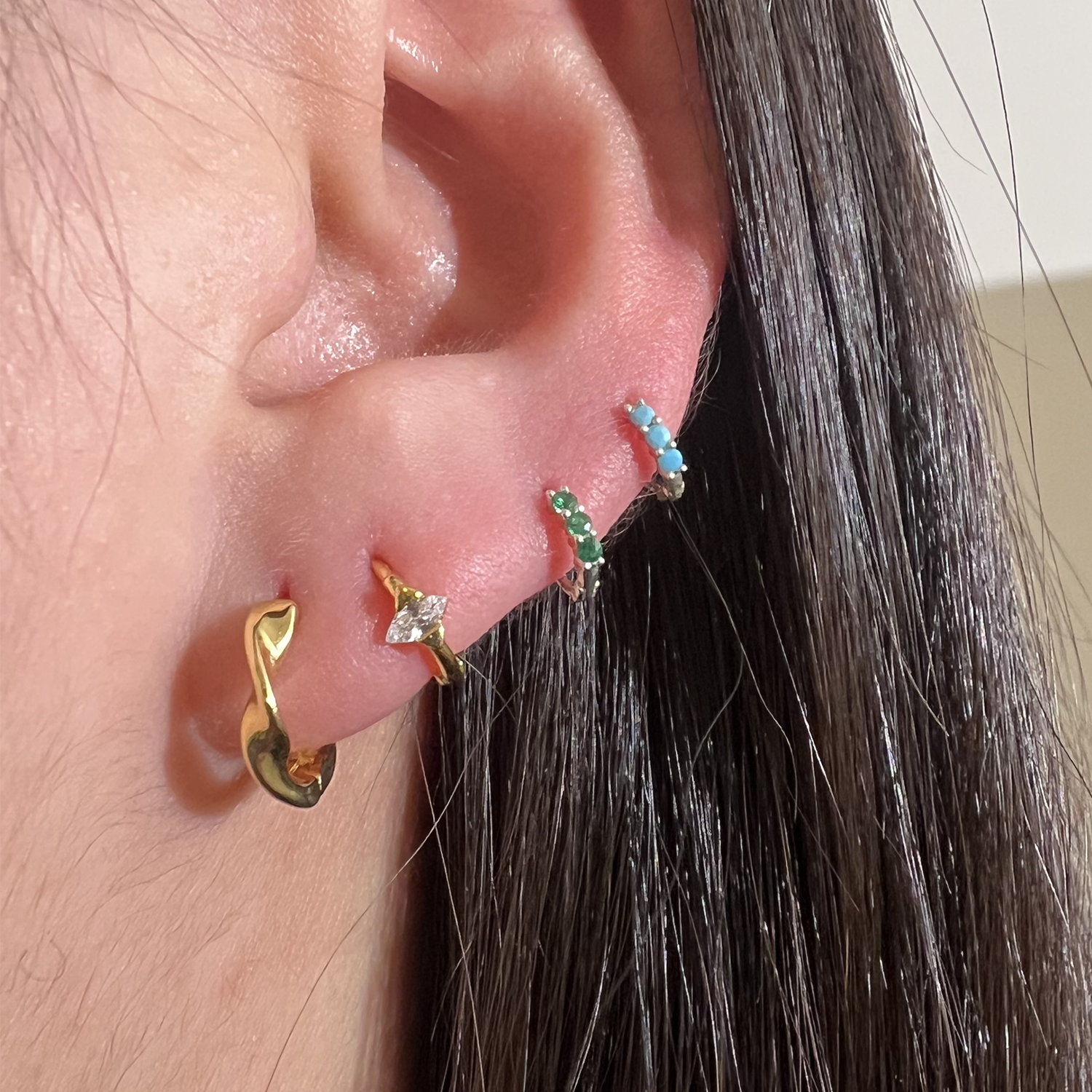 Triple gemstone huggie earring