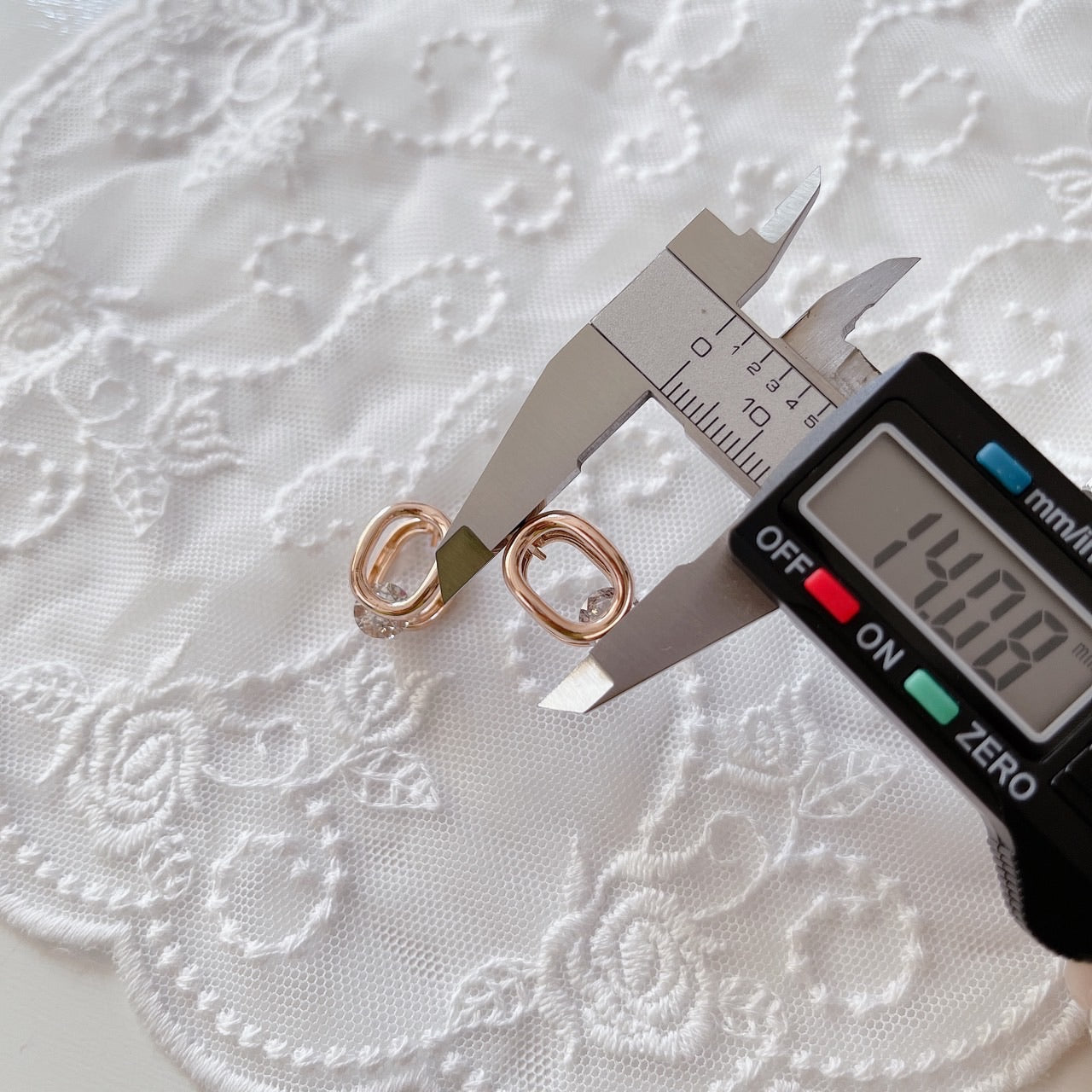 Cubic oval huggie earrings